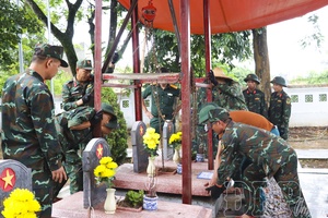 Beneath graves, a call to name the fallen