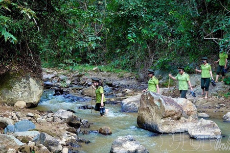 Female forest rangers well preserve green of forests